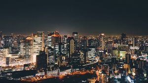 Preview wallpaper buildings, night city, skyscrapers, lights, road