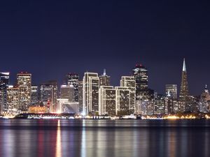 Preview wallpaper buildings, night, light, lights, reflection, river, water, houses, sky