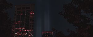 Preview wallpaper buildings, night, rays, light, city