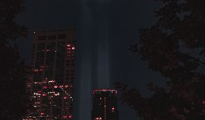 Preview wallpaper buildings, night, rays, light, city