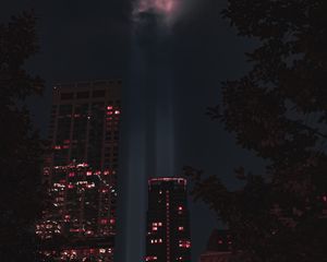 Preview wallpaper buildings, night, rays, light, city