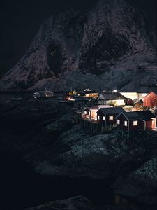 Preview wallpaper buildings, night, rocks, settlement
