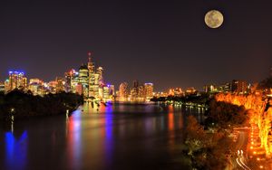 Preview wallpaper buildings, night, trees, river