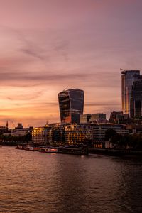 Preview wallpaper buildings, pier, boats, river, sunset