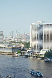 Preview wallpaper buildings, pier, river, ship, city