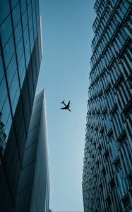 Preview wallpaper buildings, plane, sky, bottom view