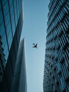 Preview wallpaper buildings, plane, sky, bottom view