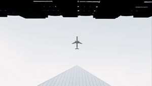 Preview wallpaper buildings, plane, sky, minimalism