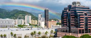 Preview wallpaper buildings, rainbow, trees, city