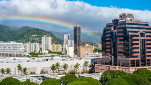 Preview wallpaper buildings, rainbow, trees, city