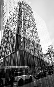Preview wallpaper buildings, reflection, street, cars, edges, bw