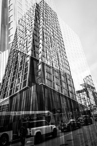 Preview wallpaper buildings, reflection, street, cars, edges, bw