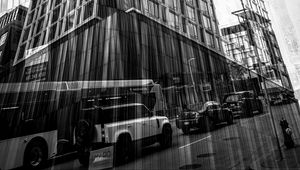 Preview wallpaper buildings, reflection, street, cars, edges, bw