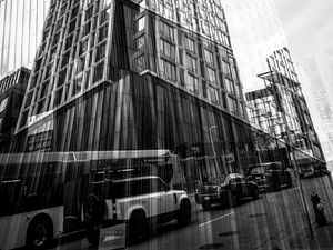 Preview wallpaper buildings, reflection, street, cars, edges, bw
