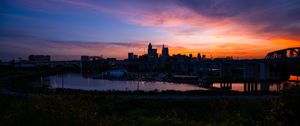 Preview wallpaper buildings, river, embankment, sunrise