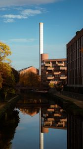 Preview wallpaper buildings, river, pipe, sky, trees, reflection