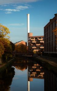 Preview wallpaper buildings, river, pipe, sky, trees, reflection