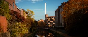 Preview wallpaper buildings, river, pipe, sky, trees, reflection