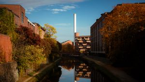 Preview wallpaper buildings, river, pipe, sky, trees, reflection