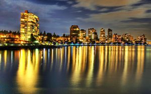 Preview wallpaper buildings, river, reflection, night, beach