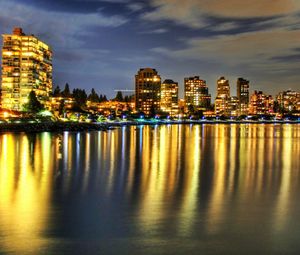 Preview wallpaper buildings, river, reflection, night, beach