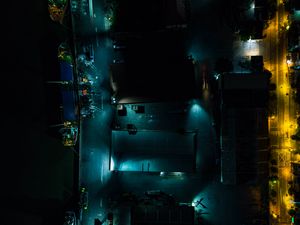 Preview wallpaper buildings, road, backlight, night, dark, aerial view