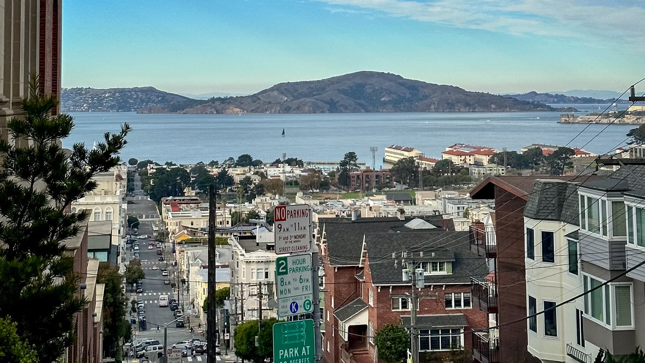 Wallpaper buildings, road, sea, hills, city