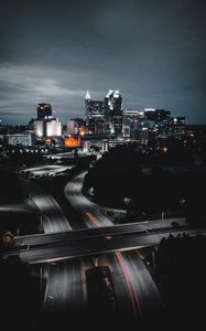 Preview wallpaper buildings, roads, aerial view, city, night