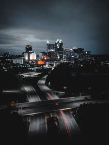 Preview wallpaper buildings, roads, aerial view, city, night