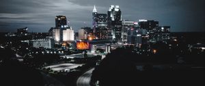 Preview wallpaper buildings, roads, aerial view, city, night