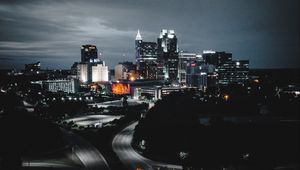 Preview wallpaper buildings, roads, aerial view, city, night