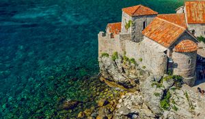 Preview wallpaper buildings, rocks, coast, sea, nature