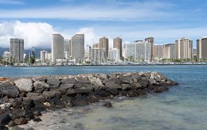 Preview wallpaper buildings, sea, water, stones, city