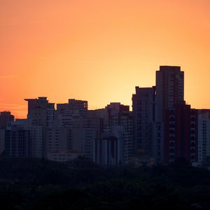 Preview wallpaper buildings, silhouette, dark, city, sunset