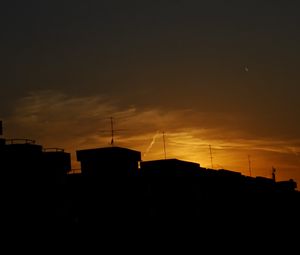 Preview wallpaper buildings, silhouette, sunset, clouds