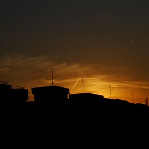 Preview wallpaper buildings, silhouette, sunset, clouds