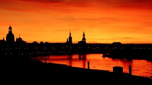 Preview wallpaper buildings, silhouettes, architecture, water, sunset, dark