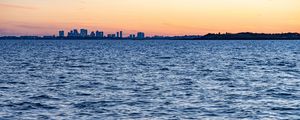 Preview wallpaper buildings, silhouettes, city, sea, horizon
