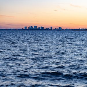 Preview wallpaper buildings, silhouettes, city, sea, horizon