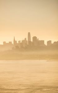 Preview wallpaper buildings, silhouettes, fog, city, coast