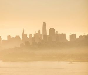 Preview wallpaper buildings, silhouettes, fog, city, coast