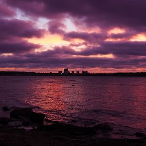 Preview wallpaper buildings, silhouettes, lake, water, twilight, purple, dark