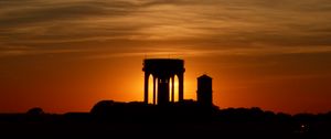 Preview wallpaper buildings, silhouettes, sky, evening, sunset