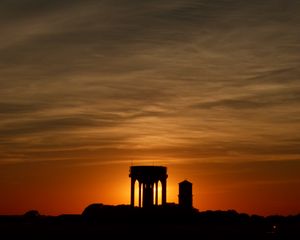 Preview wallpaper buildings, silhouettes, sky, evening, sunset