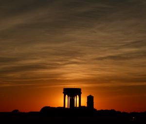 Preview wallpaper buildings, silhouettes, sky, evening, sunset