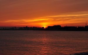 Preview wallpaper buildings, silhouettes, water, sunset, dark