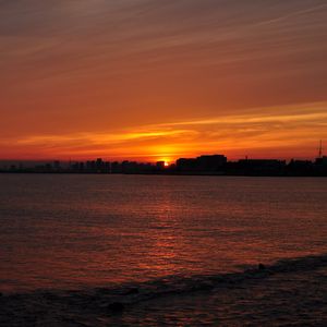 Preview wallpaper buildings, silhouettes, water, sunset, dark