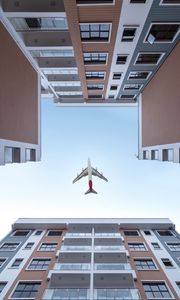 Preview wallpaper buildings, sky, plane, bottom view, architecture