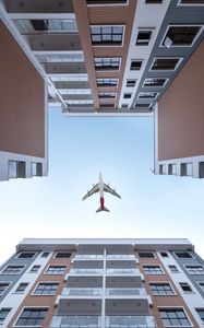 Preview wallpaper buildings, sky, plane, bottom view, architecture