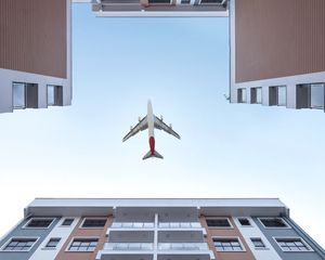 Preview wallpaper buildings, sky, plane, bottom view, architecture